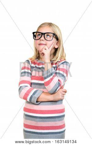 Adorable child in glasses thinking isolated on white.