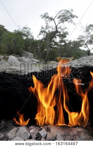 Flaming rock (Yanartas ) in Antalya Turkey is generally believed to be the ancient Mount Chimera. The wonder-fires have been burning for at least 2500 years.