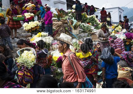 Chichicastenango Guatemala - April 27 2014: Local people in a street market in the town of Chichicastenango in Guatemala