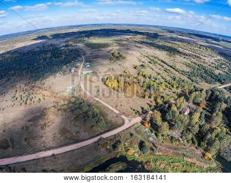 Farm Lunacharsky and abandoned the church to the cemetery. Shooting from height of the bird's flight. Maksatikhinsky District Tver Region.