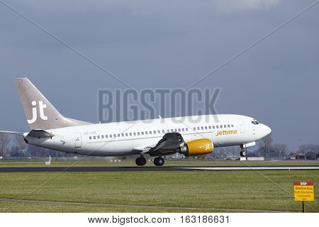 Amsterdam Airport Schiphol - Jettime Boeing 737 Lands