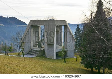 Drazgose Slovenia - December 25th 2016. The Drazgose Spomenik World War Two memorial which stands outside of the village of Drazgose. The memorial commemorates the 1942 Battle of Drazgose.
