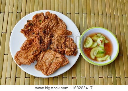 fried fish cake Thai called Tod Mun and sweet sauce