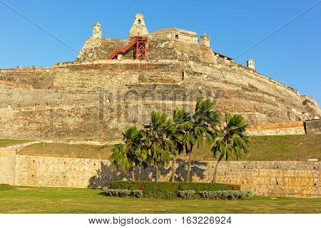 San Felipe de Barajas fortress on the Hill of San Lazaro at sunset in Cartagena Colombia. The fortress is most visited city attraction played a key role in Colonial past.