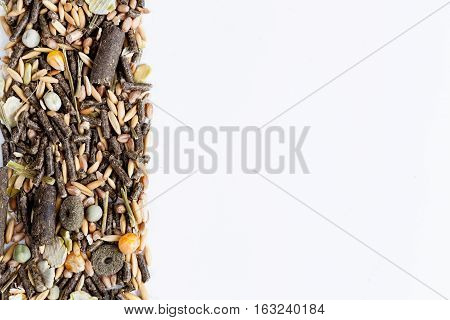 dry food for rodents on white background top view.
