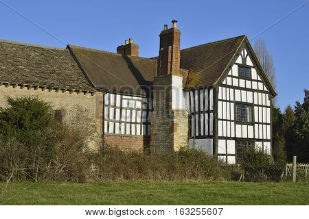 9th century Odda's Chapel & 17th century Timber Framed Abbot's Court Deerhurst Gloucestershire