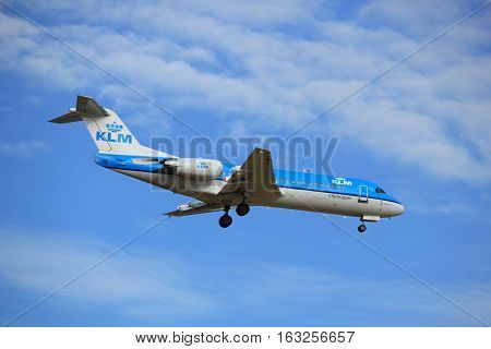 Amsterdam the Netherlands - July 15th 2016: PH-KZC KLM Cityhopper Fokker F70 approaching Polderbaan runway at Schiphol Amsterdam Airport arriving from Frankfurt Germany