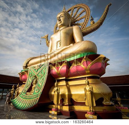 KOH SAMUI THAILAND - DEC 24 : Big Buddha at Wat Phra Yai temple is 12-metre seated Buddha statue was built in 1972 in Koh Samui on December 24 2016. Suratthani Thailand.
