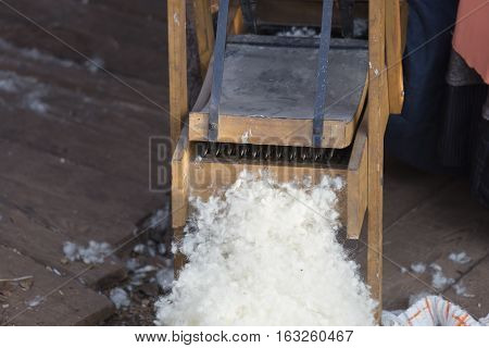 Old Wooden Carder And Raw Wool