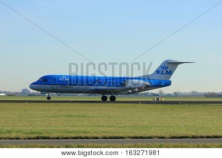 Amsterdam the Netherlands - November 25th 2016: PH-KZE KLM Cityhopper Fokker F70 taking off from Polderbaan Runway at Amsterdam Airport Schiphol