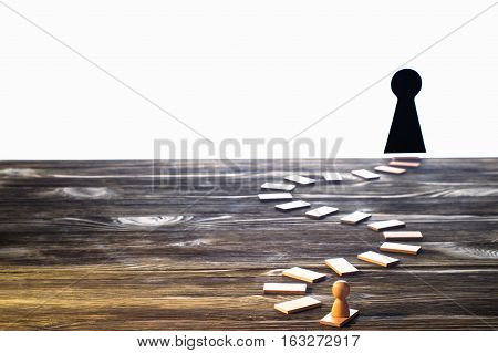 Success concept. Man looking through keyhole. Pathway of opportunity. Target achievement business metaphor.
