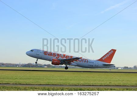 Amsterdam the Netherlands - November 25th 2016: G-EZWB Easy Jet Airbus A320-214 taking off from Polderbaan Runway at Amsterdam Airport Schiphol