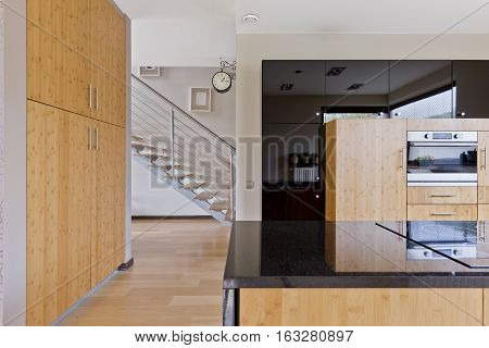 Spacious Kitchen With Wooden Furnitures