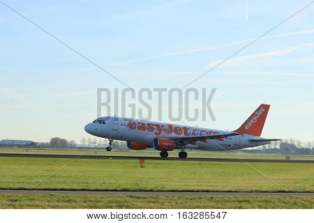 Amsterdam the Netherlands - November 25th 2016: G-EZWB Easy Jet Airbus A320-214 taking off from Polderbaan Runway at Amsterdam Airport Schiphol