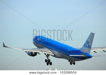 Amsterdam the Netherlands - November 25th 2016: PH-AOM KLM Royal Dutch Airlines Airbus A330 taking off from Polderbaan Runway at Amsterdam Airport Schiphol