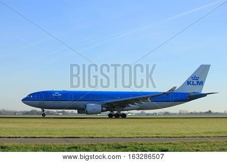 Amsterdam the Netherlands - November 25th 2016: PH-AOM KLM Royal Dutch Airlines Airbus A330 taking off from Polderbaan Runway at Amsterdam Airport Schiphol