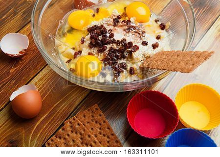 batter in the bowl before kneading with baking forms