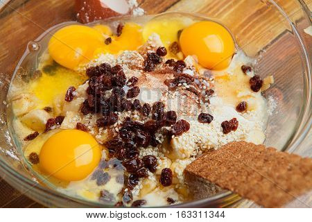 batter in the bowl before kneading with baking forms