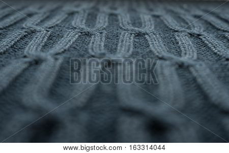 patterned knitted voluminous textile background or texture