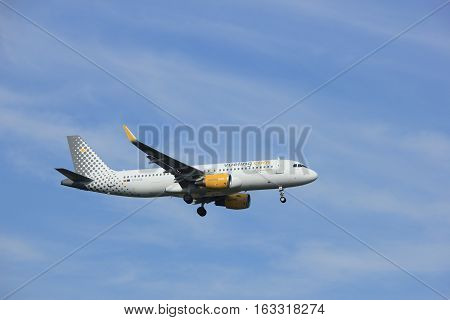 Amsterdam the Netherlands - July 21st 2016:EC-LVX Vueling Airbus A320 approaching Polderbaan runway at Schiphol Amsterdam Airport arriving from Santiago