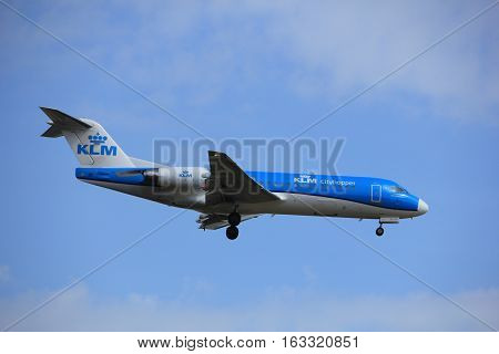 Amsterdam the Netherlands - July 21st 2016: PH-KZP KLM Cityhopper Fokker F70 approaching Polderbaan runway at Schiphol Amsterdam Airport arriving from Basel Switzerland