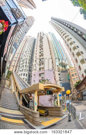 Hong Kong, China - December 4, 2016: The final section of Central-Mid-levels escalator, the world's longest escalator system, from Mosque Street to Conduit Road. Fish eye lens view.