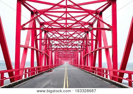 Symmetrical red steel structure construction of bridge and road in Xiluo Taiwan