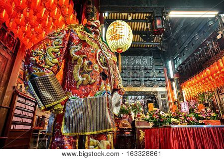 Xiluo, Taiwan - Mar. 12 : God statue in traditional old oriental chinese temple in Taiwan (Chinese Translation on lantern : name of the chinese god of sea mazu(matsu)) at Mar. 12, 2016