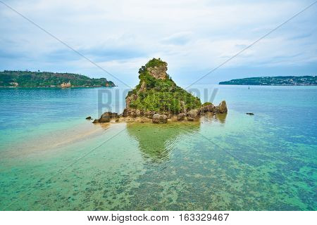 Tropical island and fantasy green sea and blue sky in Okinawa Japan