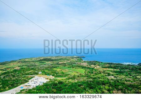 Aerial View of beautiful hill sea level with blue sky in Dai Sekirinzan park Okinawa Japan