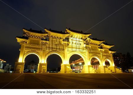 Asia culture - night view of Liberty Square (Archway of Chiang Kai Shek Memorial Hall) in Taipei Taiwan. the Chinese text on the archway : Liberty Square