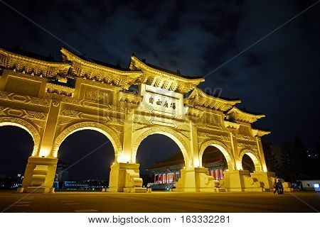 Asia culture - night view of Liberty Square (Archway of Chiang Kai Shek Memorial Hall) in Taipei Taiwan. the Chinese text on the archway : Liberty Square