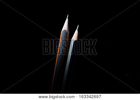 Black Pencils On Black Background