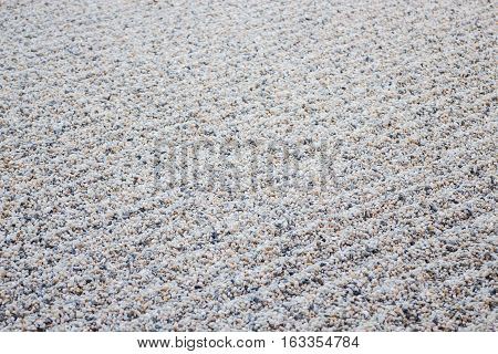 Zen gardens typically contain gravel pattern stock photo