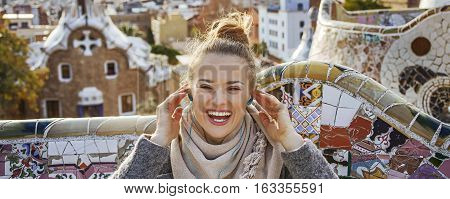 Happy Tourist Woman In Barcelona, Spain Sitting On Bench