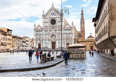 Tourists On Piazza Di Santa Croce With Basilica