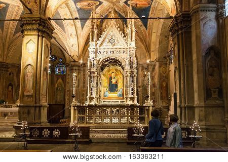 Visitors In Orsanmichele Church In Florence