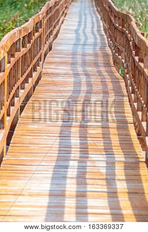 walkway with old pavilion in lake of Khao Samroiyod National Park, Prachuap Khiri Khan, Thailand.