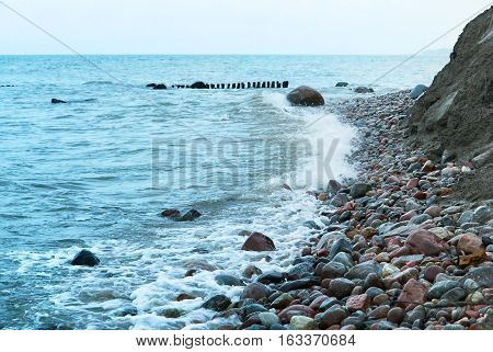 sea wave coast of the Baltic sea blue sea waves beat on the rocks sea stones