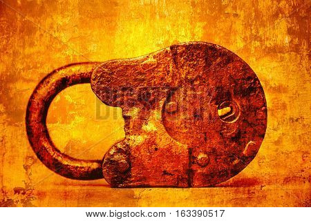 Double exposure of an old padlock and yellow abstract bright orange background. Design art photo processing