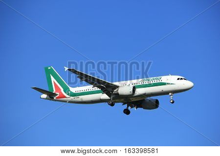 Amsterdam the Netherlands - July 15th 2016:EI-DSB Alitalia Airbus A320 approaching Polderbaan runway at Schiphol Amsterdam Airport arriving from Rome Italy