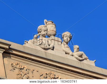 Zurich, Switzerland - 27 December, 2016: sculpture on the top of the Credit Suisse headquarter building on Paradeplatz square. The building was built in 1872-1877, designed by architect Jakob Friedrich Wanner.