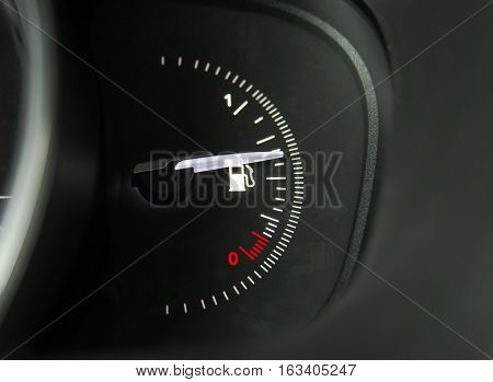 Close-up shot of a fuel gauge in a car