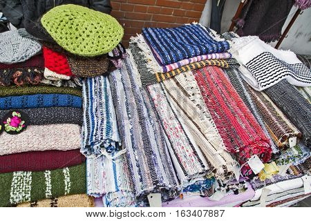 Of domestic hand-woven patchwork on a table.