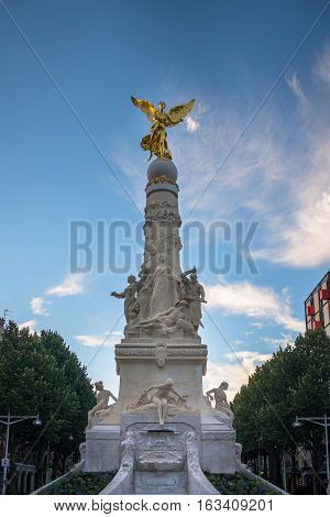 Sube fountain with golden angel and statues in Reims, Champagne France
