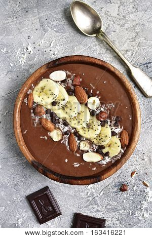 Chocolate Banana Smoothie Bowl With Nuts And Chia Seeds.top View.
