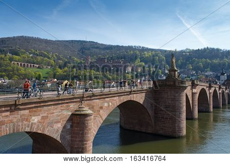 HEIDELBERG, GERMANY - MAR 29, 2014: The old bridge Alte Brucke across the river Neckar in the old german city Heidelberg. Monkey bridge.