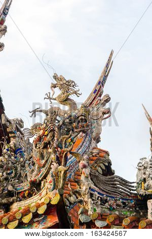 Asia culture concept - Roof with beautiful decoration of famous heritage landmark the traditional old oriental Chinese temple lungshan in Taipei Taiwan