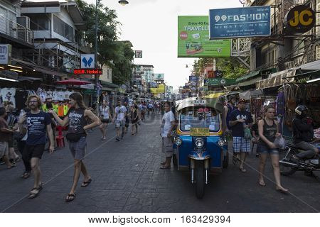 BANGKOK THAILAND - DEC 24 : scene of tuktuk taxi in Khao San road on december 24 2016. tuktuk is popular server for tourist in Bangkok.