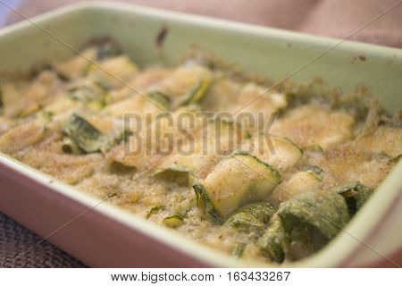 oven pan of zucchini au gratin with breadcrumbs